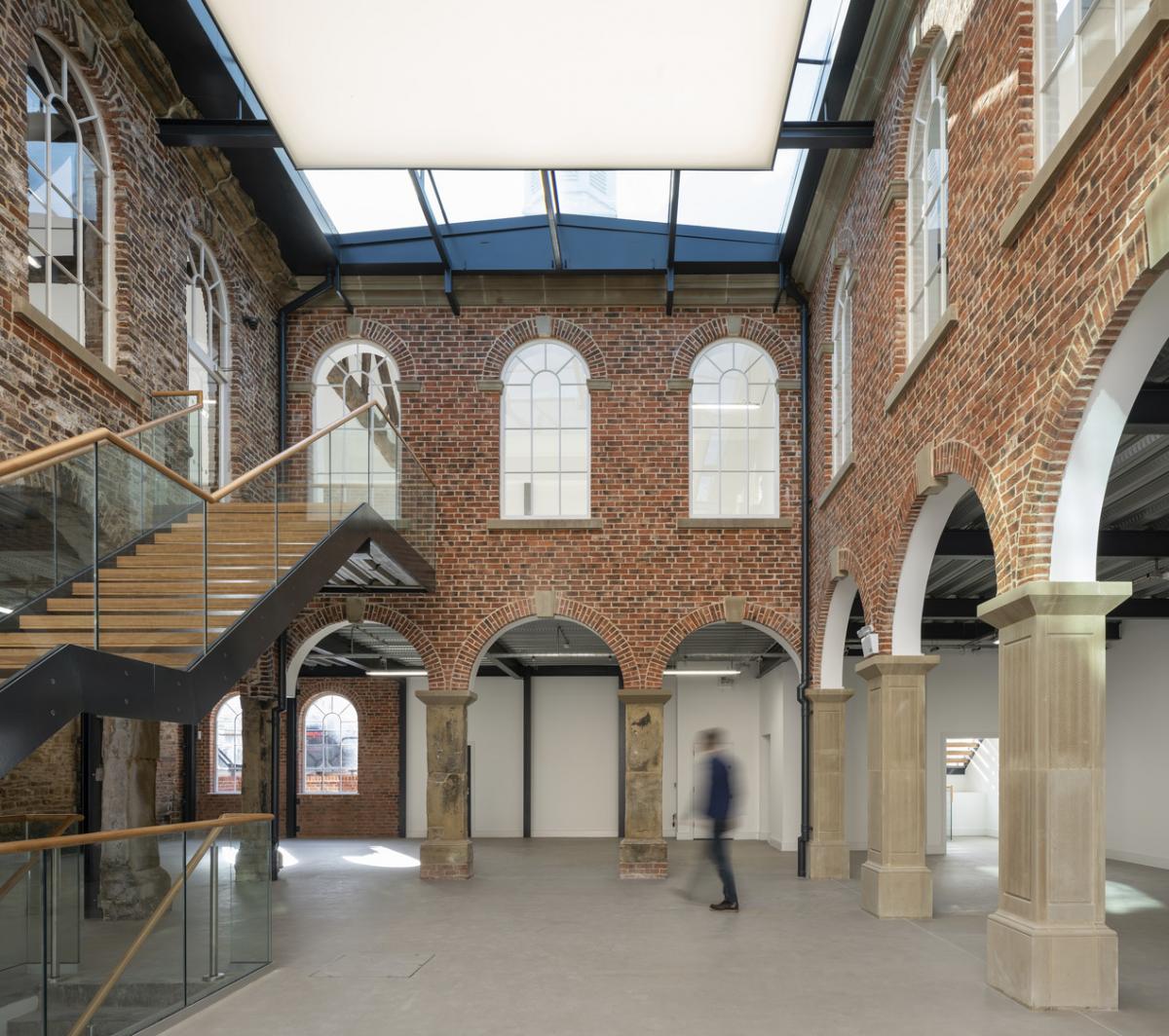 interior view of first white cloth hall with walking man