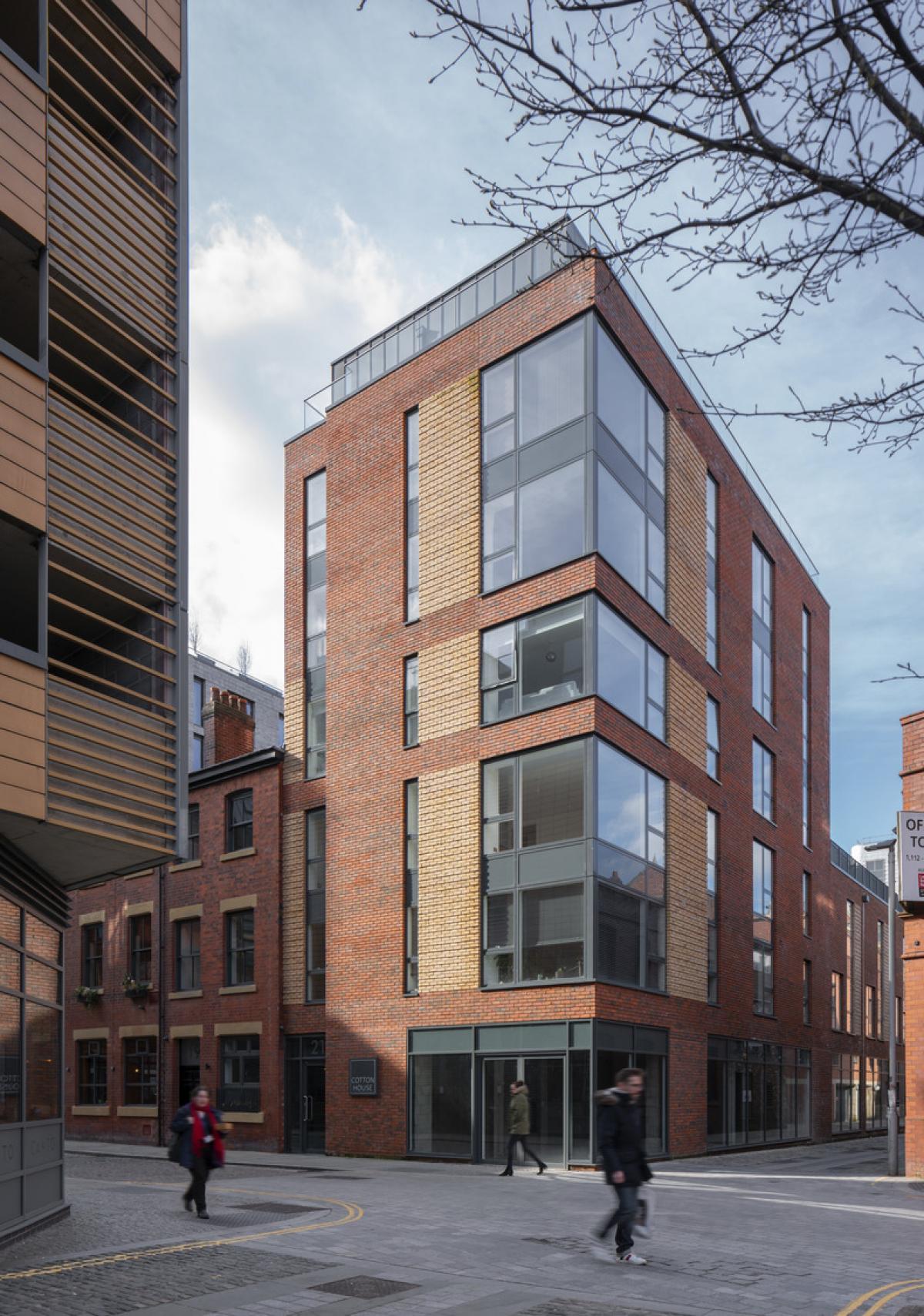 Exterior view of a contemporary apartment block