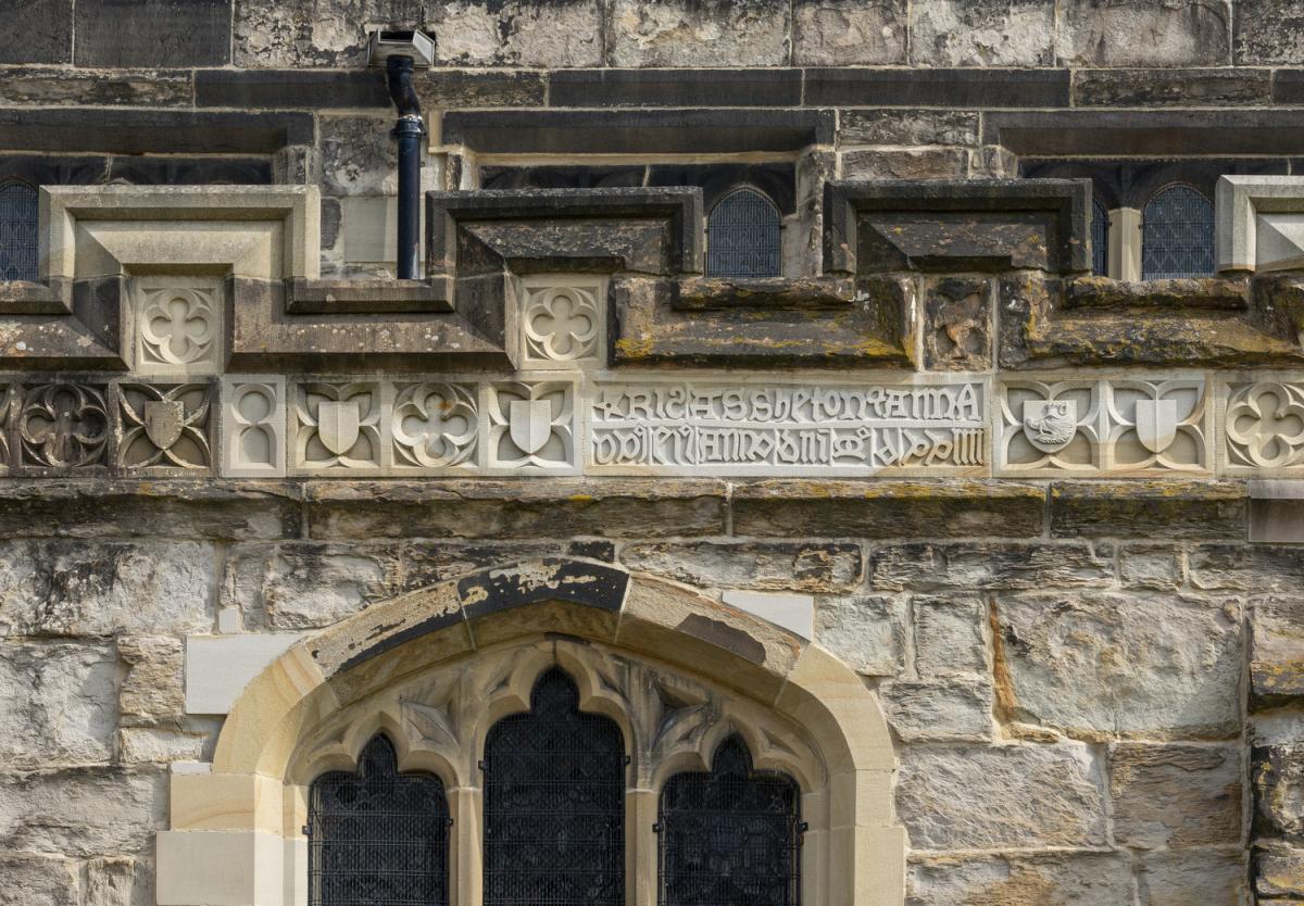 Exterior photo of a medieval carving on a church 