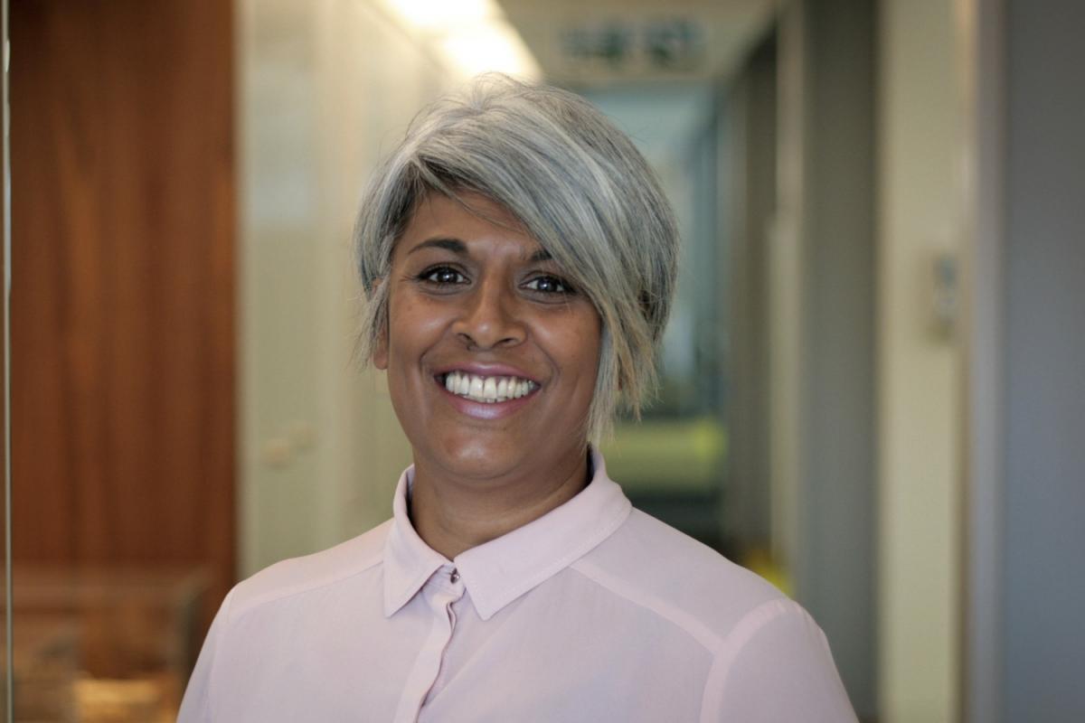 headshot of chithra marsh, smiling