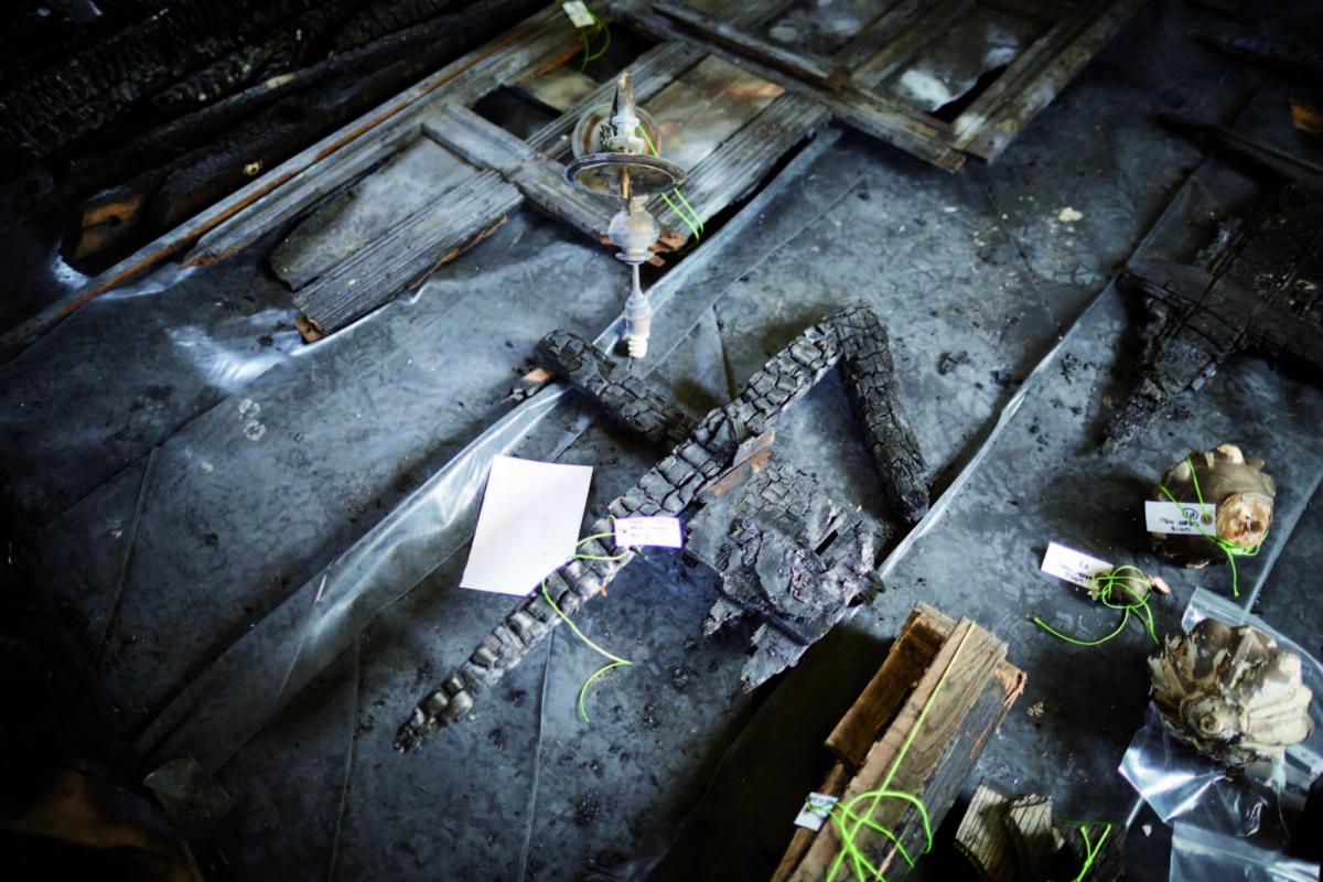 damaged elements of wythenshawe hall laid on floor 