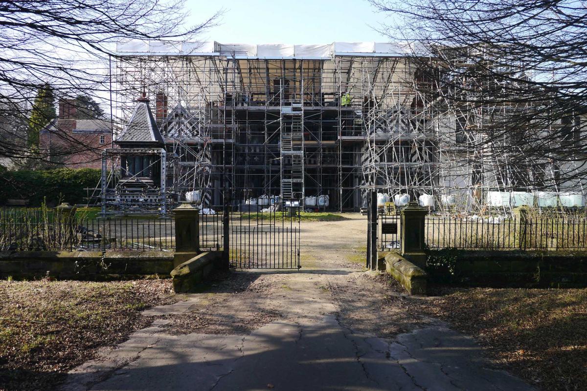 exterior of wythenshawe hall covered in scaffolding