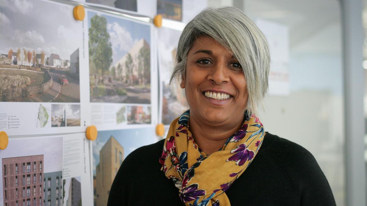 headshot of chithra marsh, smiling