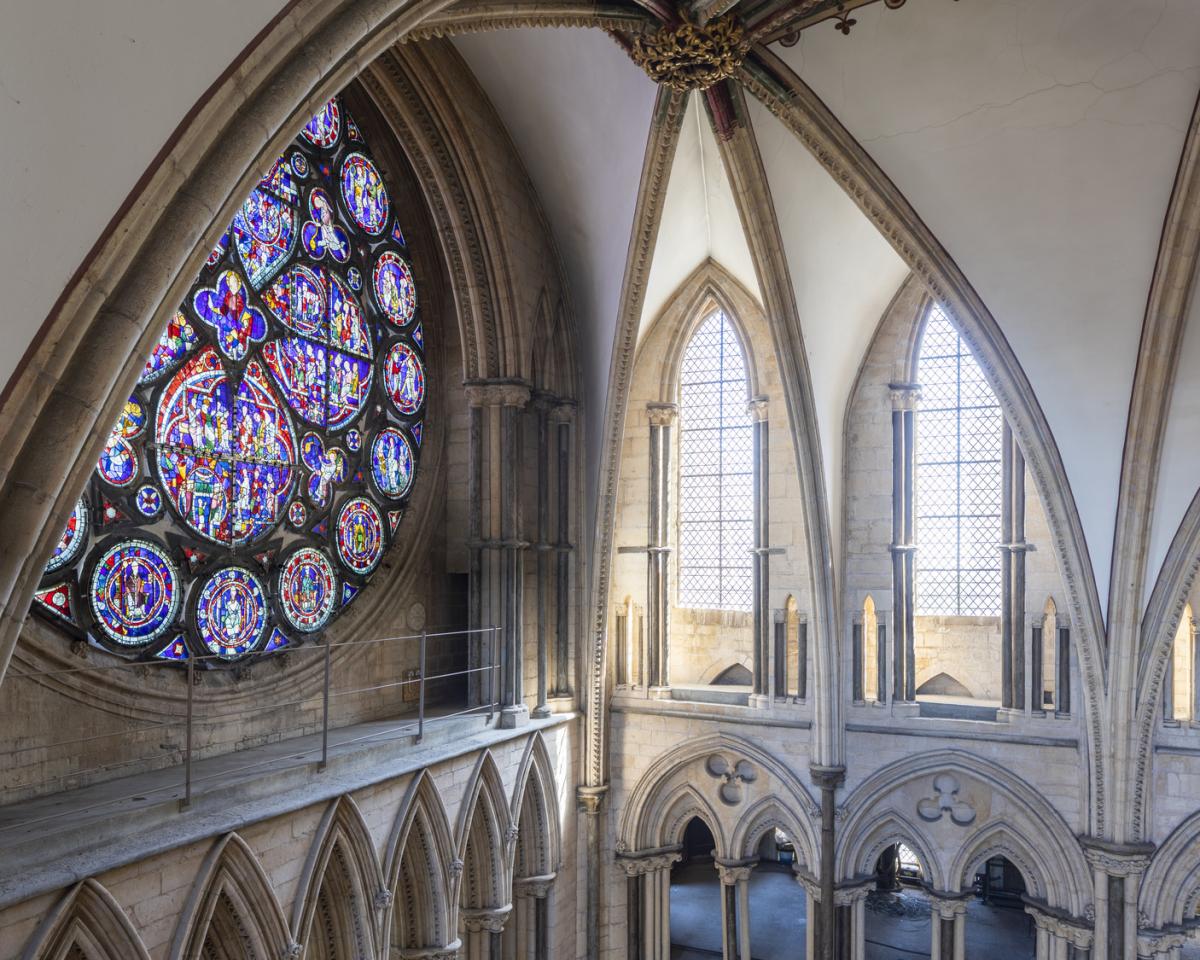 Interior photo of a stained glass window in a cathedral