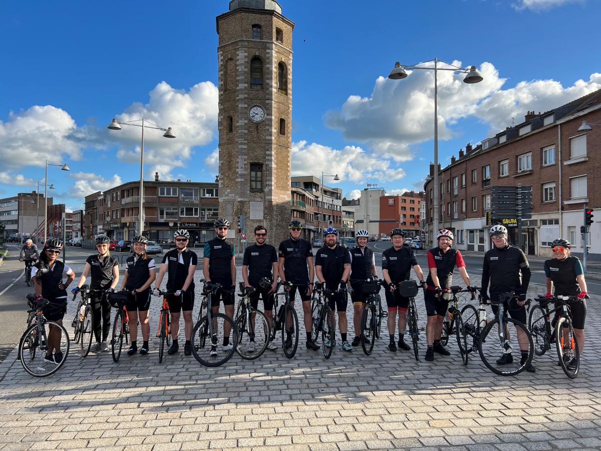 A group of people on a charity bike ride.