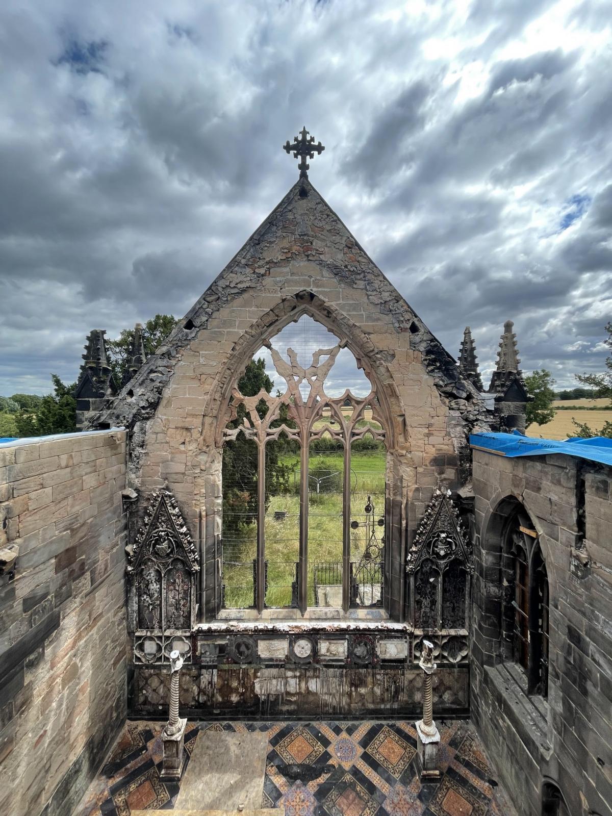 all saints church without roof, exposing the fire damaged interior