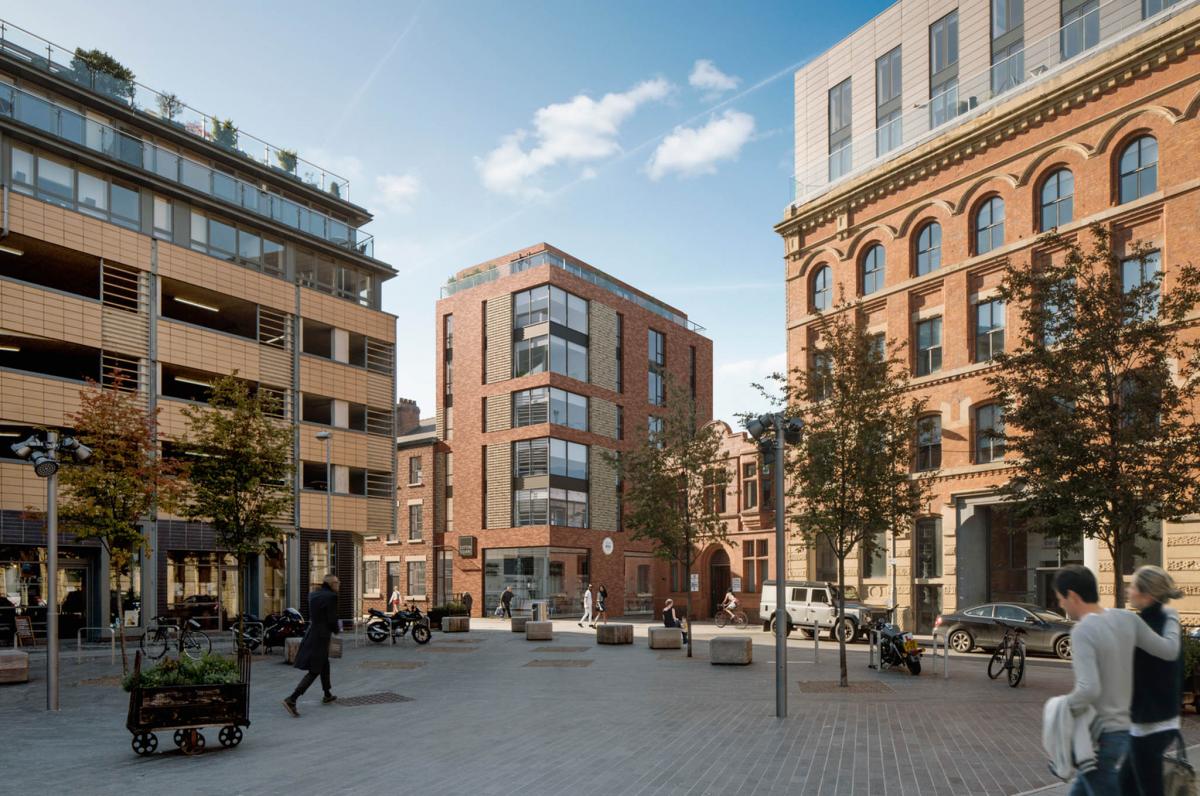 outside view of cotton square building showing cutting room square and pedestrians