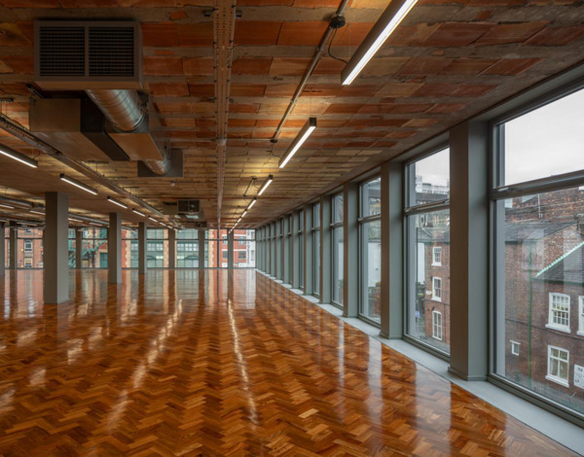 Interior of hilton house workspace, polished wood floors, vacant space