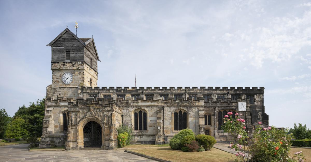 exterior of st leonards church within greenery