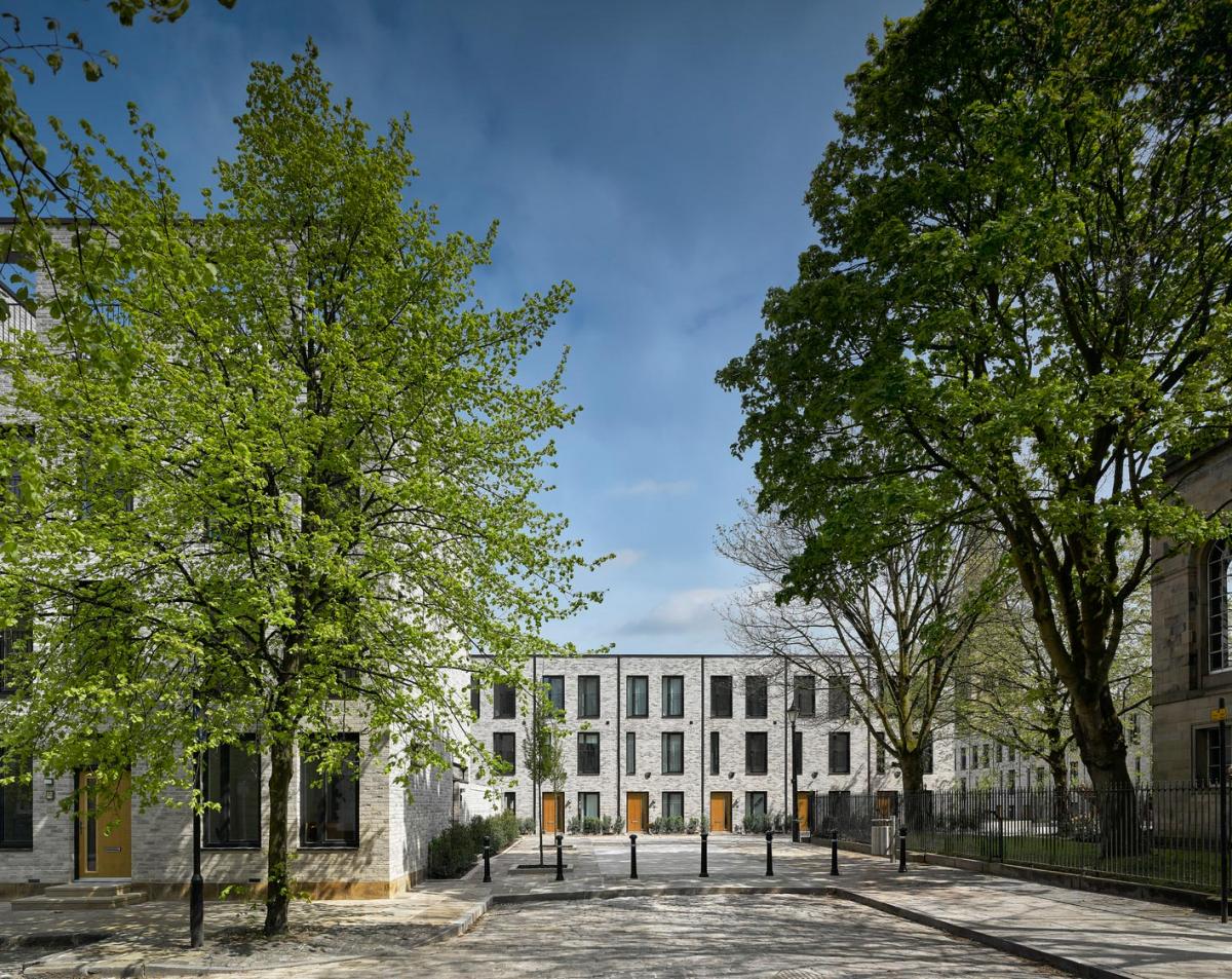 exterior of timekeepers square with bollards and trees