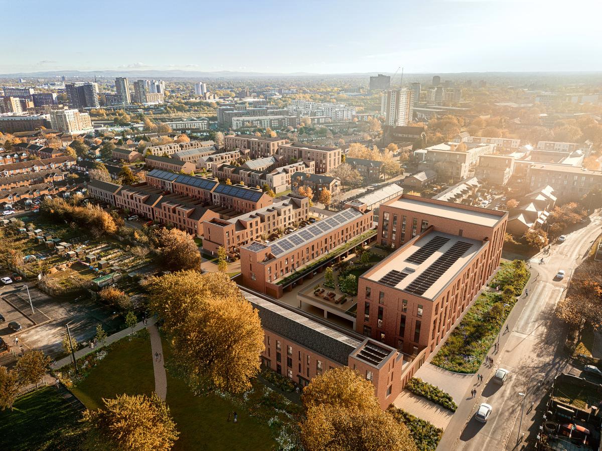 Aerial view of housing scheme. The project is an an urban area and formed mainly in U-shaped blocks. 