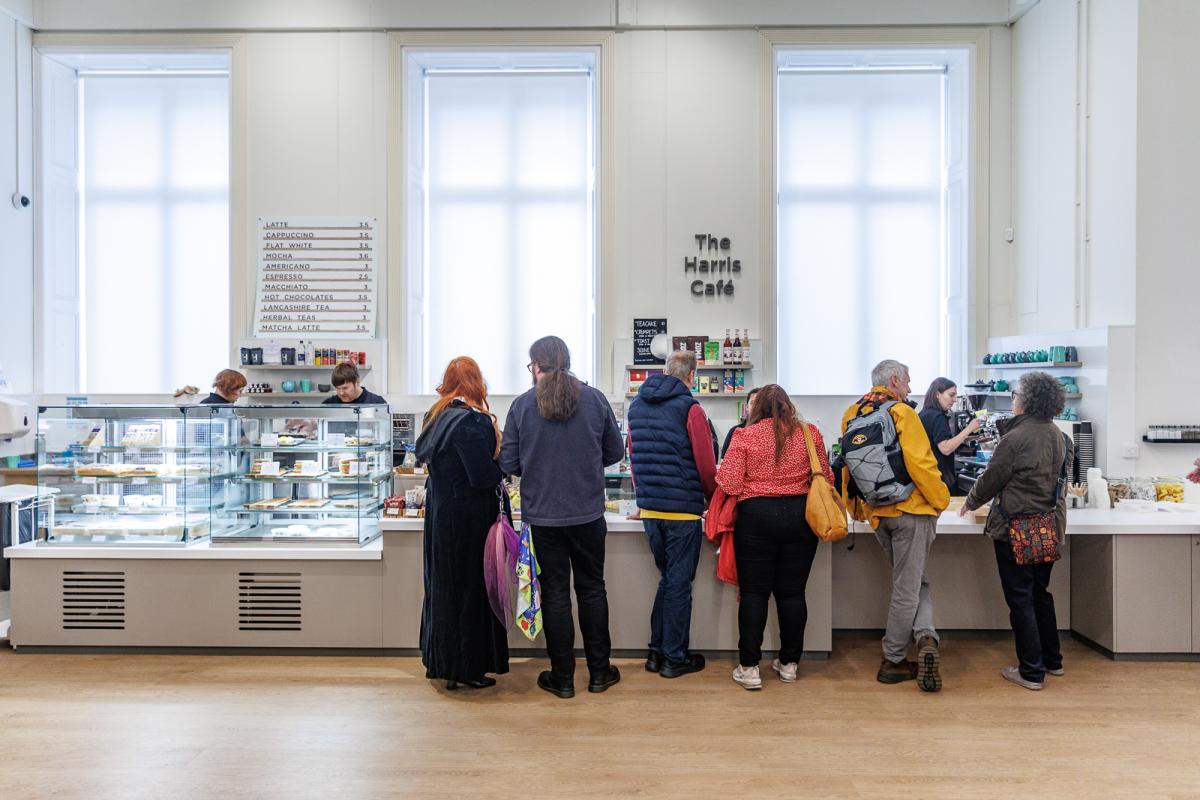 A group of people stood in front of exhibits