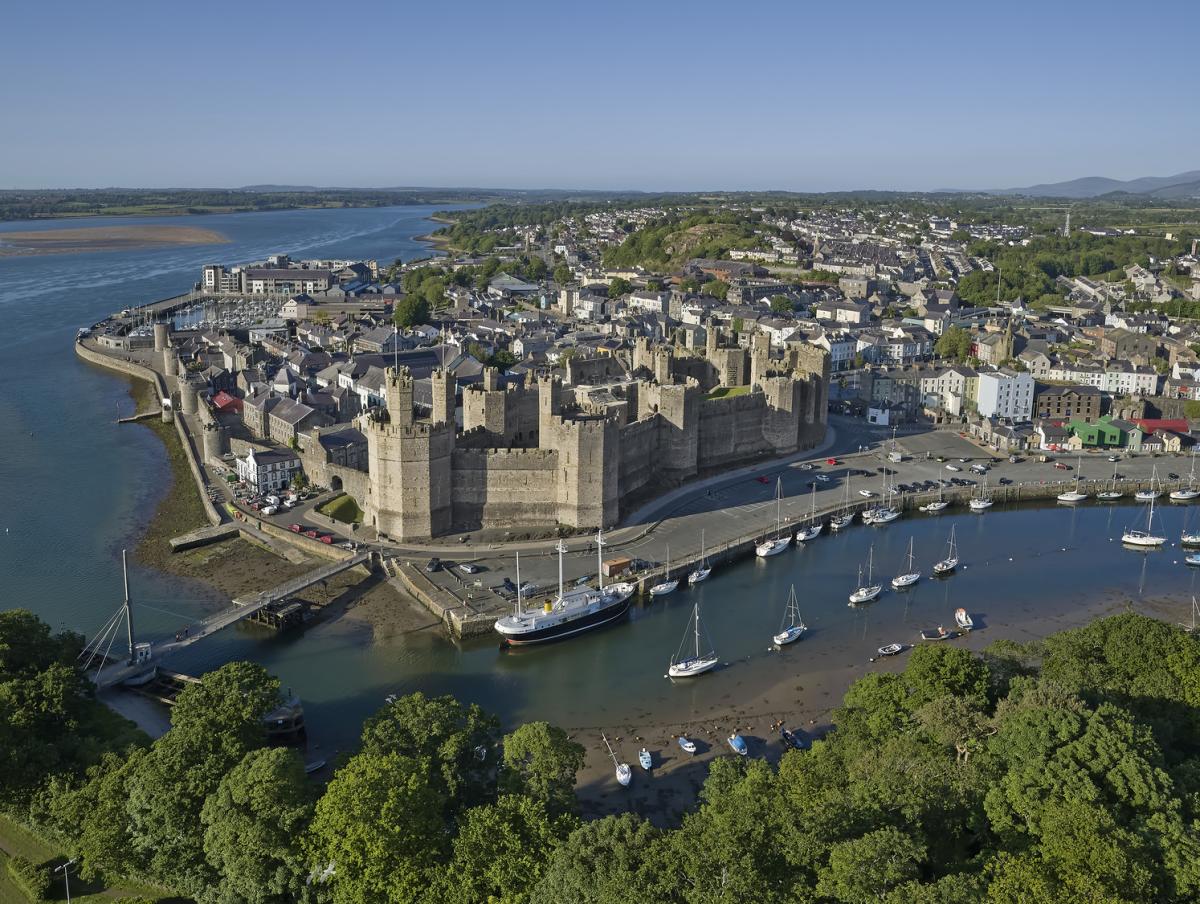an aerial image looking towards castell caernarfon