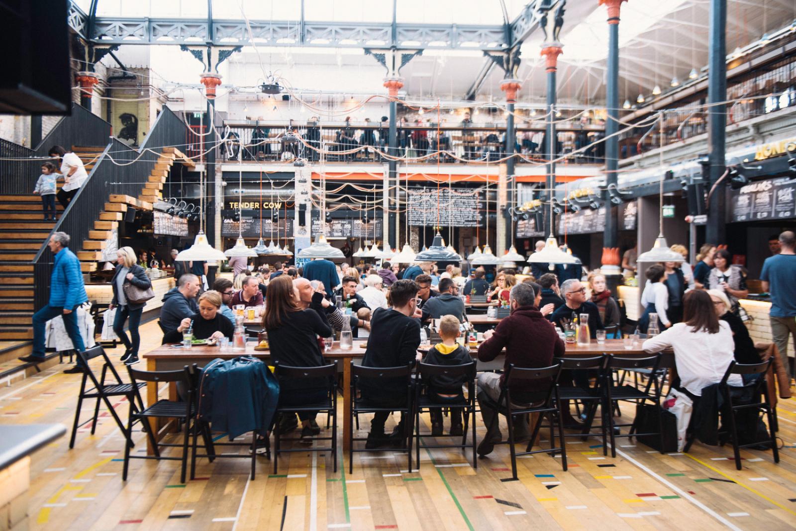 People eating in a dining hall.