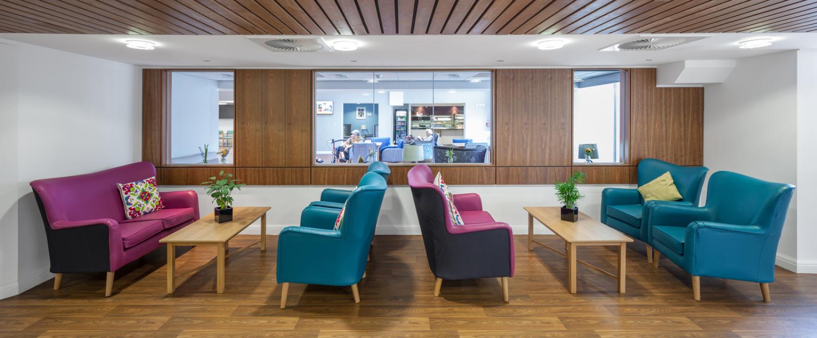 interior of heathlands village, purple and blue sofas