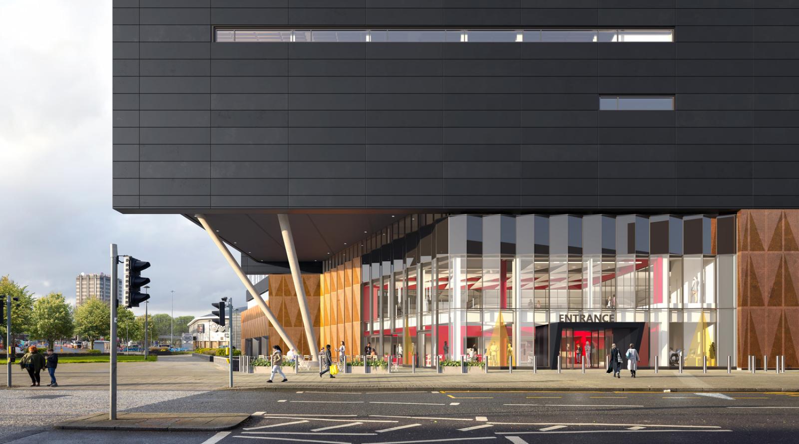 Road with large building.  Top part rendered in black with the lower part being windows. 