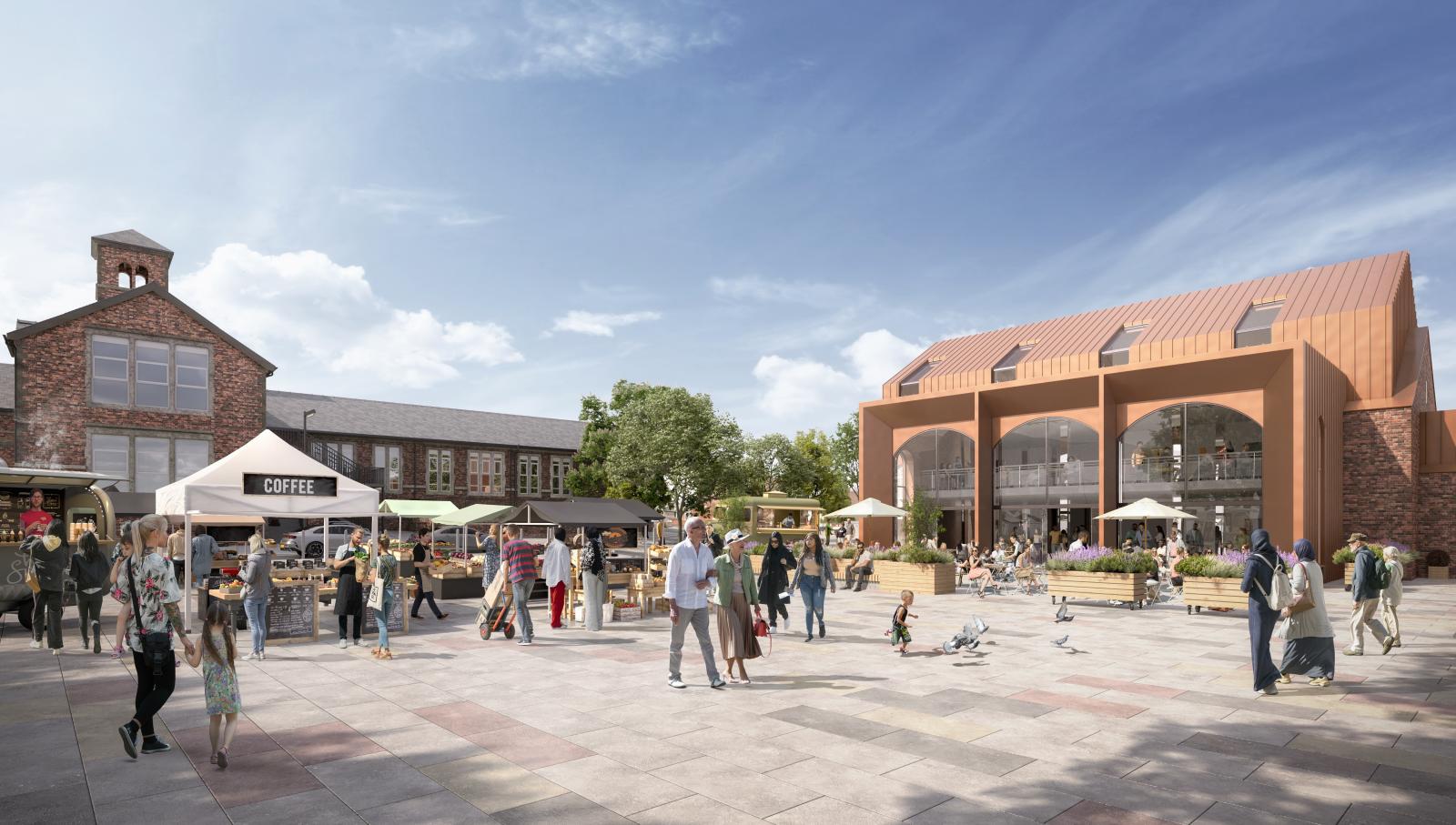 Outdoor image.  Town square with people enjoying what's on offer.  To the right is a glazed building with three glazed large arch shaped windows.  In the background is a traditional clock tower building.  