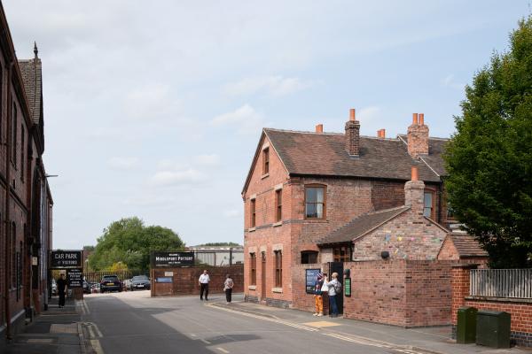 the end house of a brick terraced row