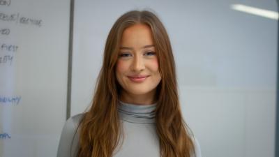 headshot of tamsin eddy, smiling