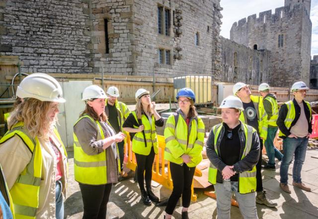 buttress group in hi-vis site visit to caernarfon castle