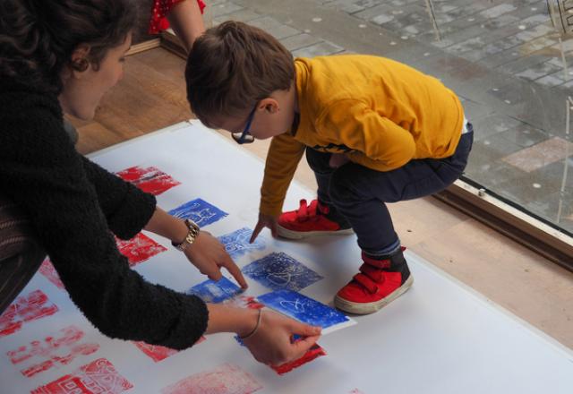 small child participating in arts and craft activity