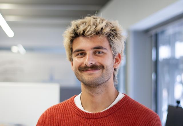 Headshot of Ed Kamal, a man with blonde hair looking at the camera