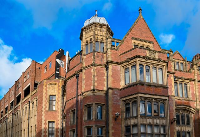 Red brick building against a blue sky