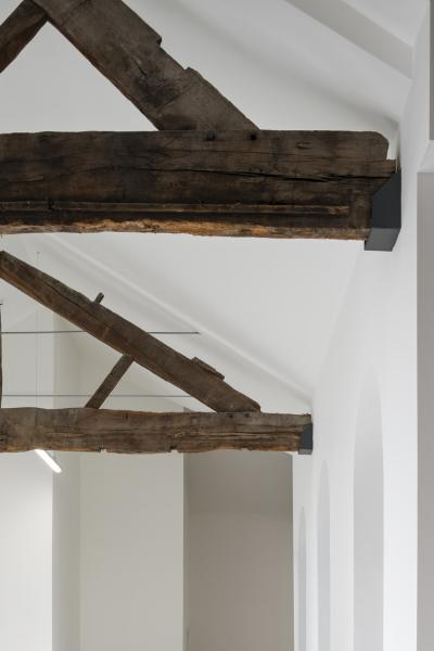 A close-up of oak timber trusses.