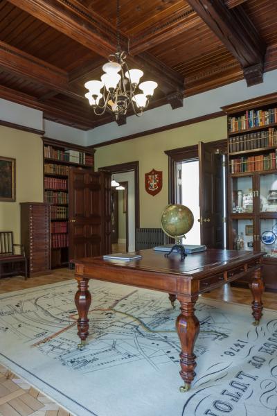 An exhibition room in a Victorian house.