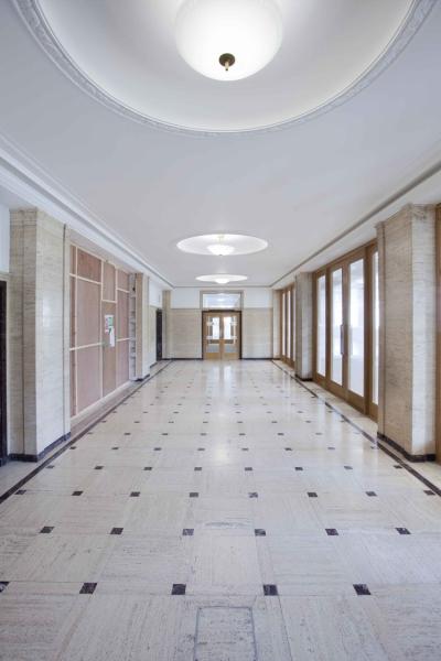 the fifth floor corridor of the india buildings is an art deco style space