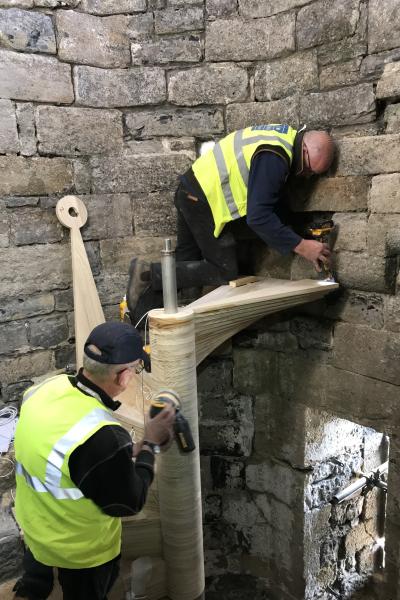 two contractors make the spiral stair at caernafon castle