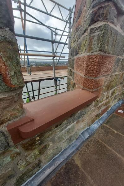 A medieval window frame which shows the new stone inserts and the original stone. 