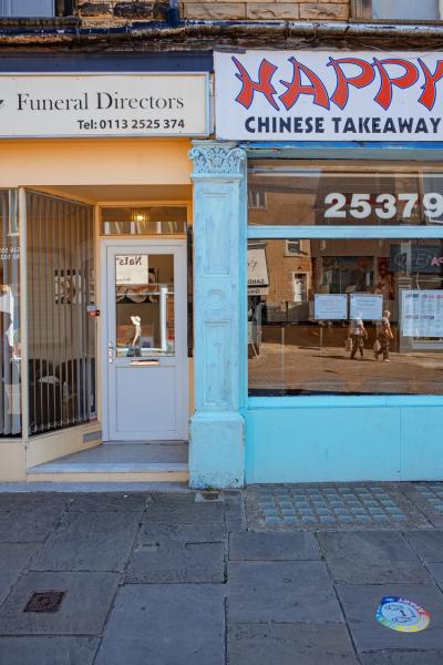 a turquoise pillar from a shopfront