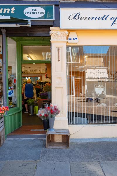a cream painted pillar from a historic shopfront