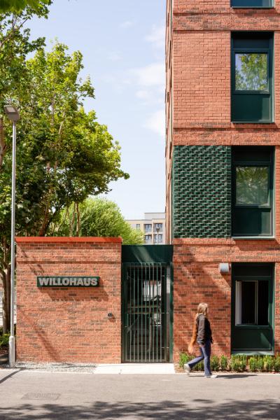 A view outside of Willohaus with wayfinding