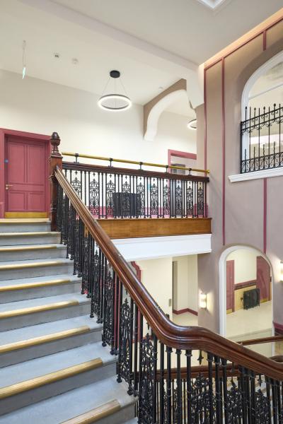 A restored historical staircase and steps upwards.
