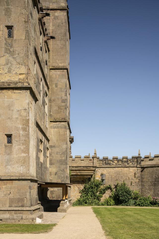 Exterior image of a Grade I listed castle with contemporary rainwater canopy.