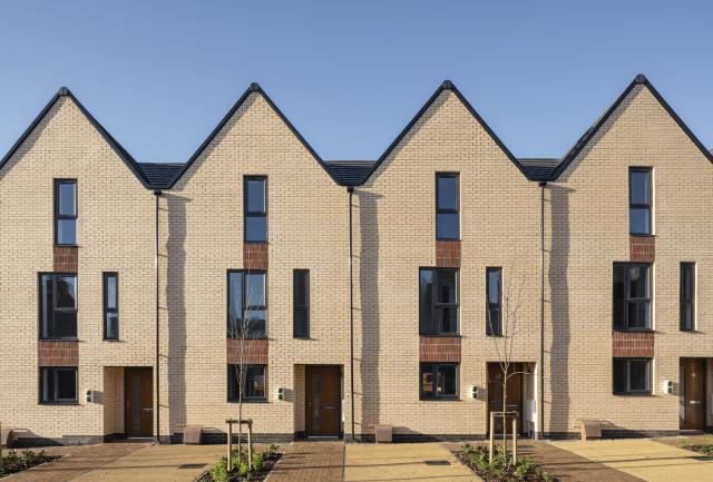 External view of a row of modern terraced houses 