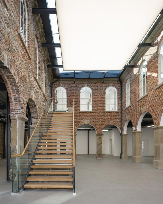 interior of first white cloth hall, including stairs