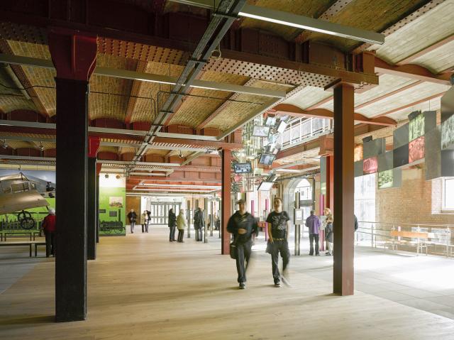 interior of MSI with visitors and steel columns