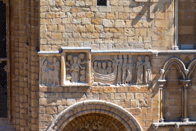 Exterior photo of medieval stone carvings on a cathedral