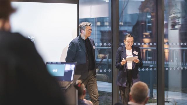 a man and woman doing a presentation