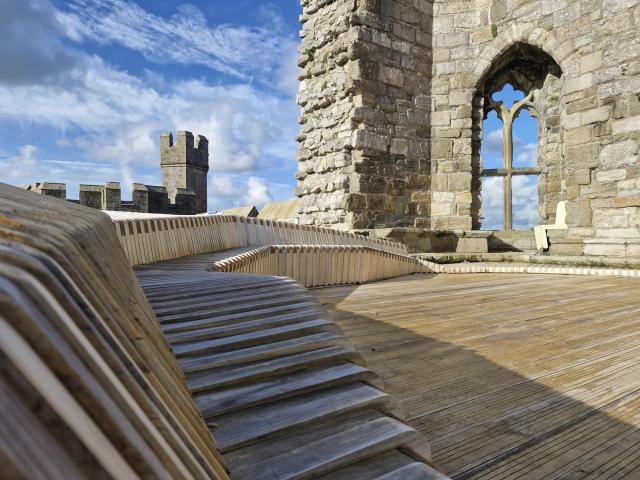 an organic wooden bench at Caernarfon Castle