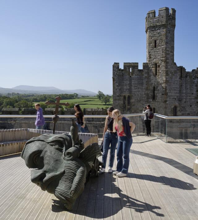 people enjoying the interpretation at Caernarfon Castle King's Gate