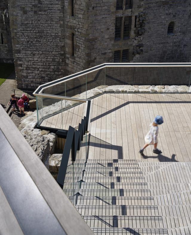 A little girl walks across the new deck at Caernarfon Castle