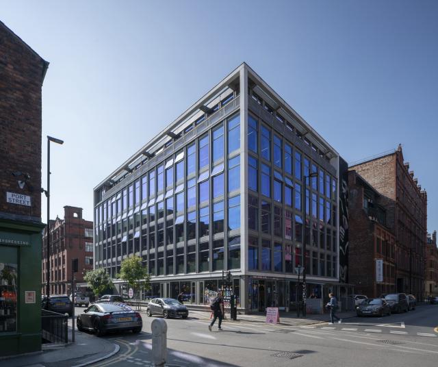 Hilton House - a glazed office block with blue reflecting in the windows