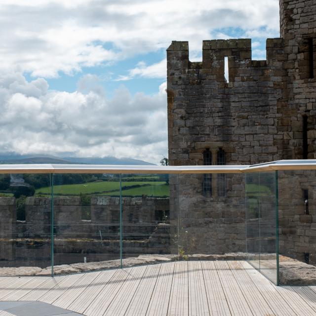 The glass balustrade at Caernarfon Castle on the timber upper deck