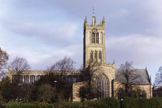 a stone church on a winters day