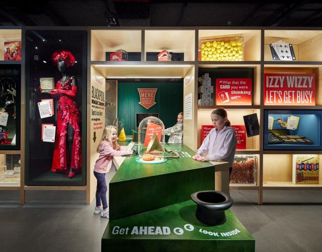 Children playing with an interactive museum exhibit