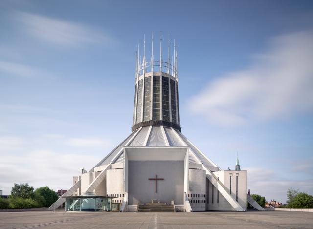 Exterior of Liverpool Metropolitan Cathedral, a grey and white triangular building